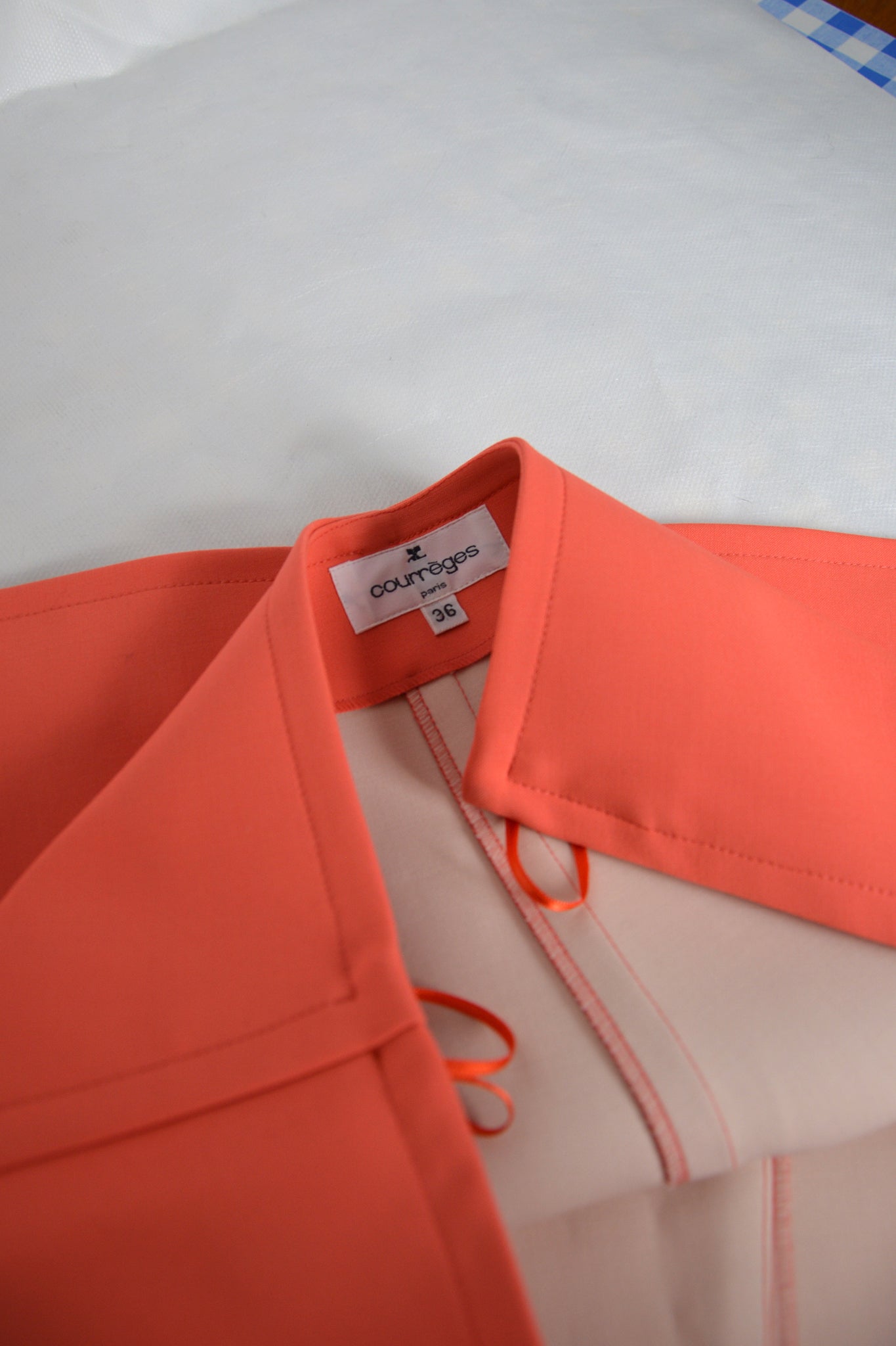 courrèges mini skirt bright orange curly hair roberto cavalli white shirt
